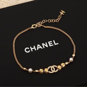 CHANEL Gold Necklace with Pearl and Crystal Details